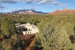 An aerial review of this Spanish style Sedona retreat